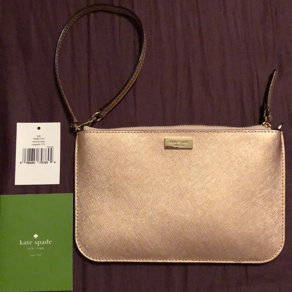 Beautiful rose gold kate spade wristlet